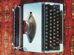 Type Writer  The Silver – Reed SR180 De Luxe