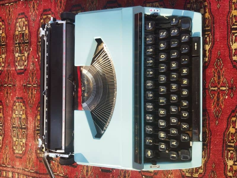 Type Writer  The Silver – Reed SR180 De Luxe 0