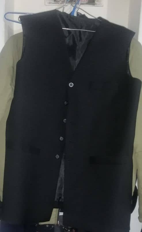 I m selling one coat and one westcoat brand new Pak made black color. 1