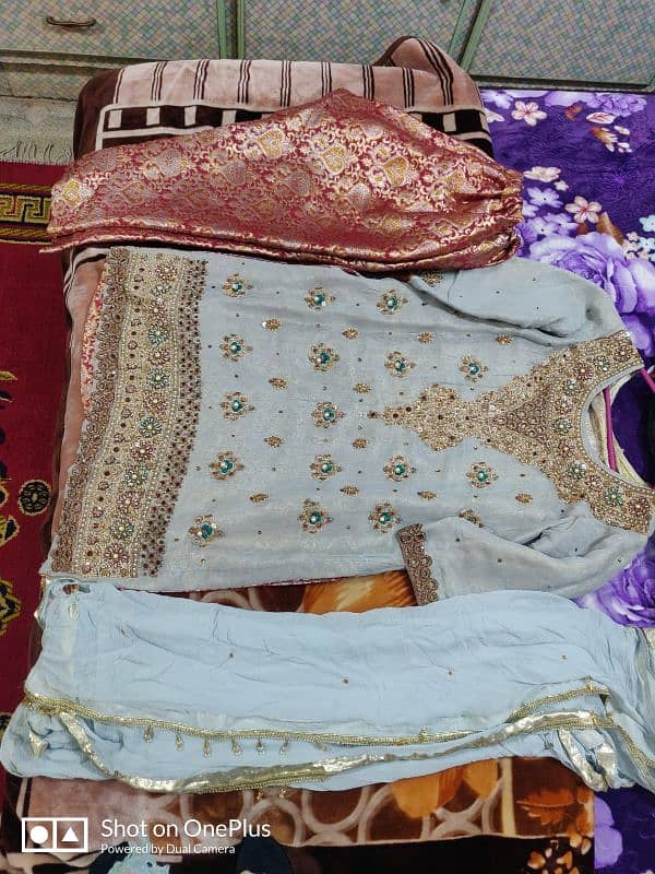 Bridal lehnga  good condition just 1 time used and 1 party wear suit 15