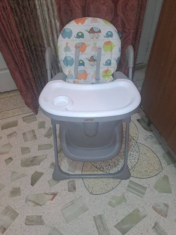 high chair just like new 1