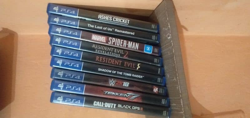 PS4 with box and 9 Games 4