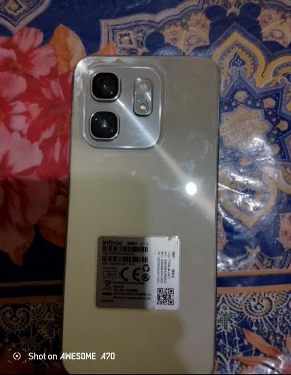 Infinix hot 50i 12/128 New condition 10months warranty Urgent sale 0