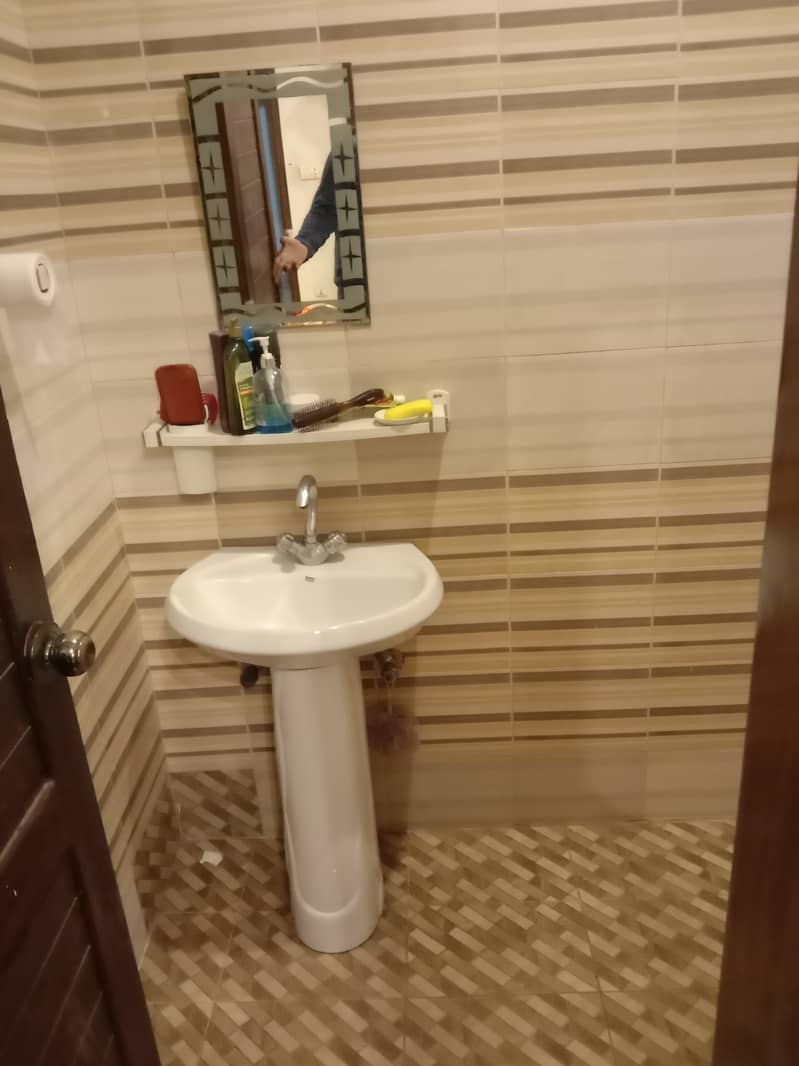 A single room along with attached washroom, kitchen and dinning area 2