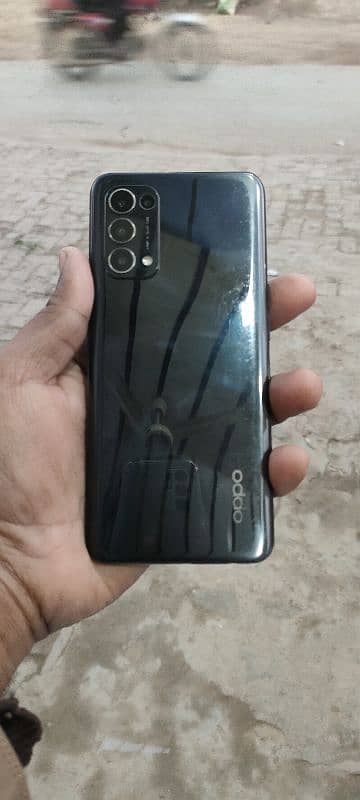 oppo Reno 5.8. 128 front finger 2