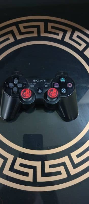 PS3 IN 10/8 CONDITION with games 7