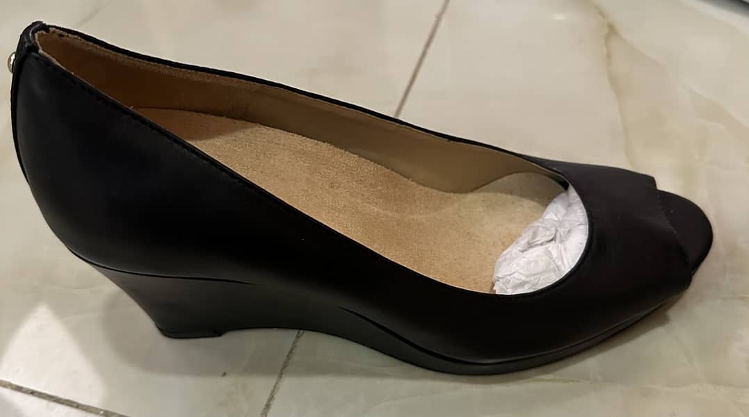 Imported Black patent leather 0