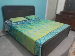 wooden double bed