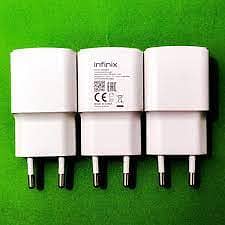 Infinix 18W fast charger model HY15w S/N KT07016403621