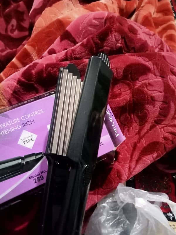 I'm selling my hair curler brand new 1