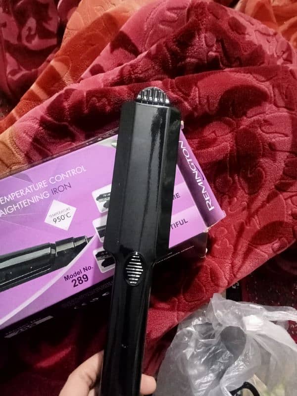 I'm selling my hair curler brand new 2