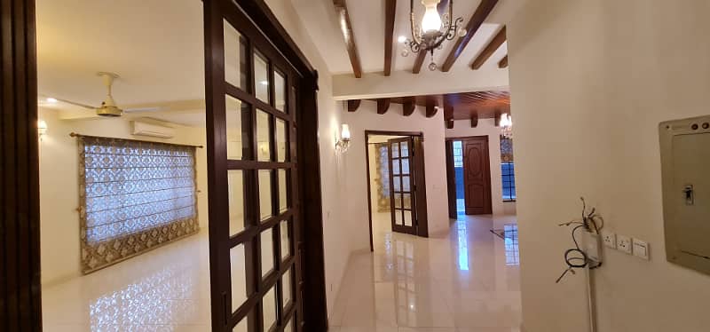 F-11/2: MARGALLA ROAD, 666 Yards MAGNIFICENT CORNER HOUSE, MODERN ARCHITECTURAL, TRIPLE STOREY, 9 Bedrooms, SUPERB/STRIKING LOCATION, Rent is Rs. 1200000/- Final, 12