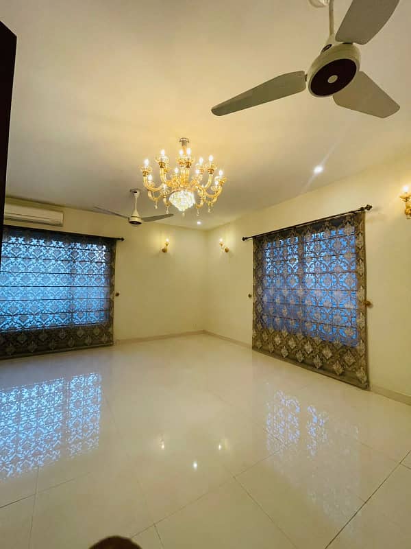 F-11/2: MARGALLA ROAD, 666 Yards MAGNIFICENT CORNER HOUSE, MODERN ARCHITECTURAL, TRIPLE STOREY, 9 Bedrooms, SUPERB/STRIKING LOCATION, Rent is Rs. 1200000/- Final, 21