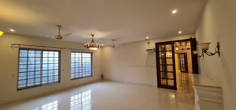 F-11/2: MARGALLA ROAD, 666 Yards MAGNIFICENT CORNER HOUSE, MODERN ARCHITECTURAL, TRIPLE STOREY, 9 Bedrooms, SUPERB/STRIKING LOCATION, Rent is Rs. 1200000/- Final, 25