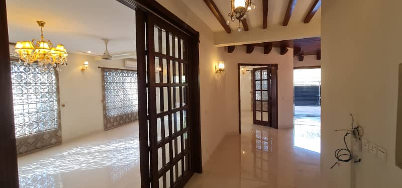 F-11/2: MARGALLA ROAD, 666 Yards MAGNIFICENT CORNER HOUSE, MODERN ARCHITECTURAL, TRIPLE STOREY, 9 Bedrooms, SUPERB/STRIKING LOCATION, Rent is Rs. 1200000/- Final, 48