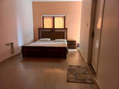 F-11: Semi-Furnished Spacious Room, Attached Bathroom, Balcony, Shared Kitchen, Calm Environment, Single Student Or Working Single Male Preferred, Rent Rs 35,000/-.