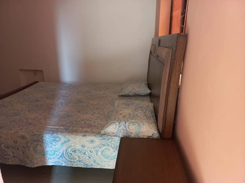 F-11: Semi-Furnished Spacious Room, Attached Bathroom, Balcony, Shared Kitchen, Calm Environment, Single Student Or Working Single Male Preferred, Rent Rs 35,000/-. 4