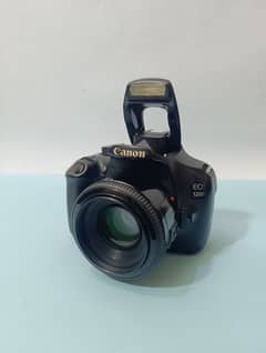 Canon 1200D DSLR with 50mm lens