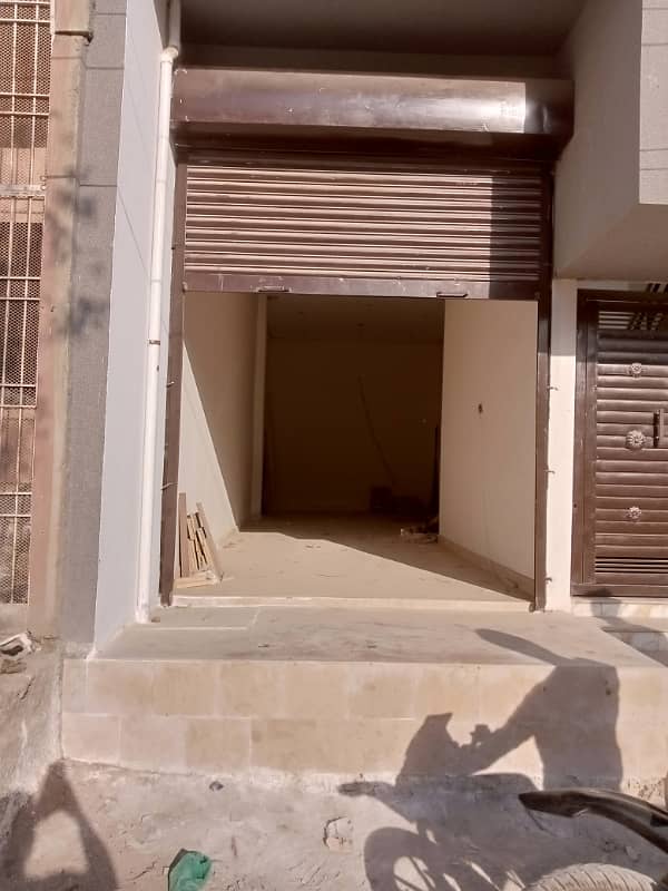 Shop For sale 45 sq yards frornt 8 ft deep 31.5 ft 2