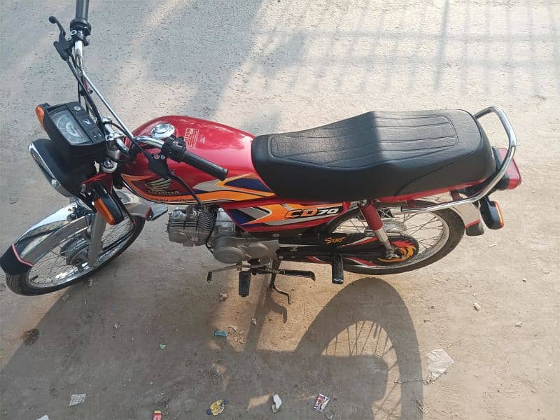 Honda cd70 24/25 red colour no chat only call 1