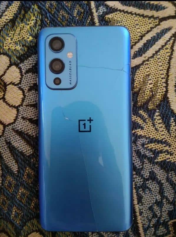 OnePlus 9 global 5G main board not working and back are cracked 0