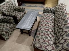 5 seater sofa along with center table