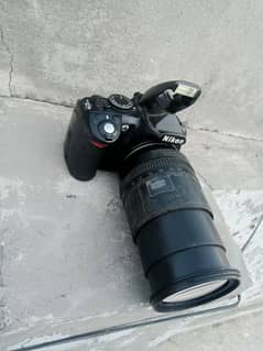 Nikon. d3100 with 18/105 manual lense all assesries price kum nhi honi