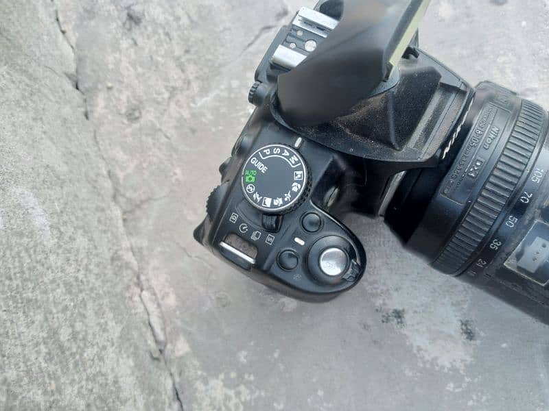 Nikon. d3100 with 18/105 manual lense all assesries price kum nhi honi 6