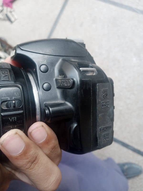 Nikon. d3100 with 18/105 manual lense all assesries price kum nhi honi 7