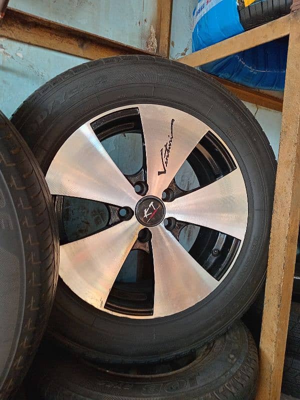 Tyres rims dunlop yokohama  toyota alto vitz suzuki mehran swift coure 11