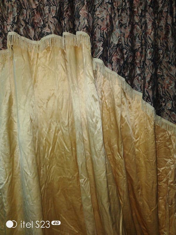 Shiny yellow colour curtains 1