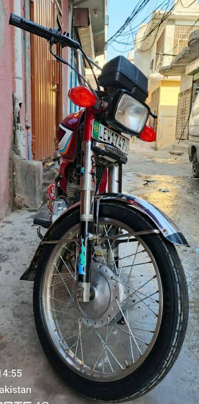 Honda 125 for sell. . . lahore number. 3165539134 2