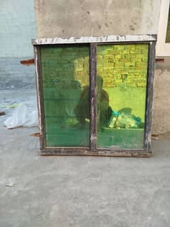 Iron Sliding Window with Mercury Glass