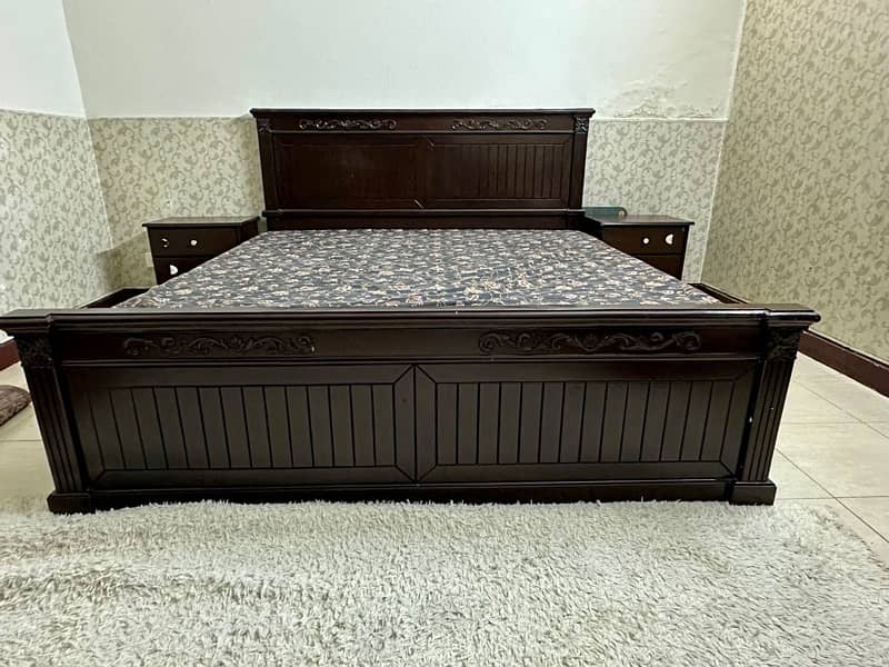 wooden bed with side tables and mattress 1