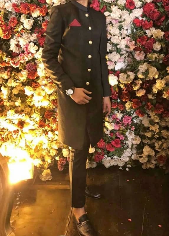 Black sherwani with golden buttons 0