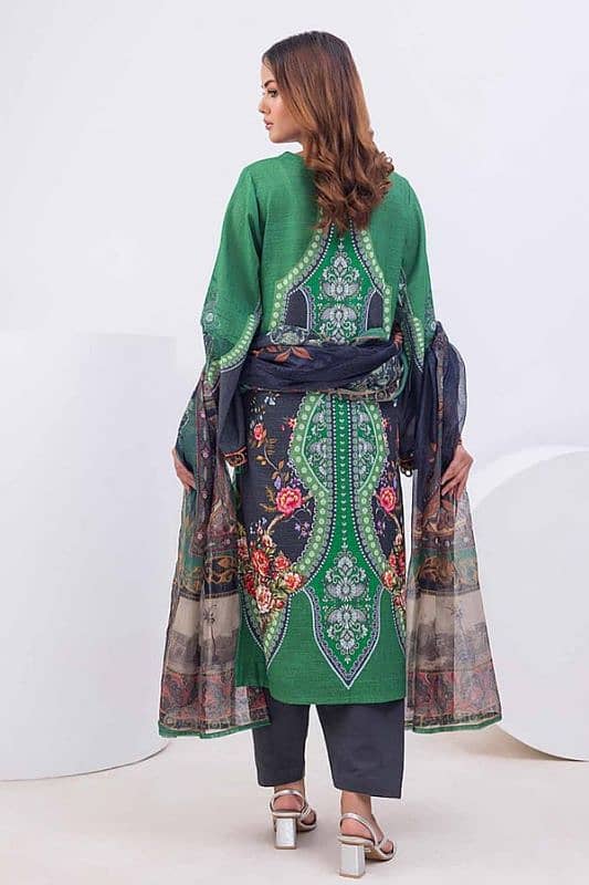 3 Piece Printed Khaddar Unstitched Suit with Net Dupatta. 1