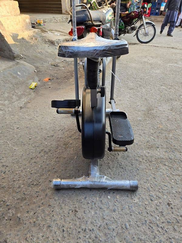 Exercise bikes(0329-4545517)Gym cycles, Ellipticles,Air bike,Spin bike 13