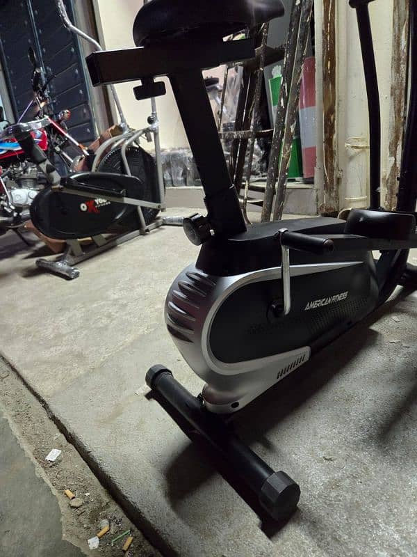 Exercise bikes(0329-4545517)Gym cycles, Ellipticles,Air bike,Spin bike 17