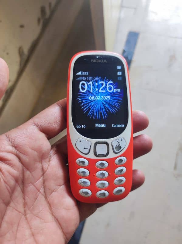 Nokia 3310 mobile and adopter 2