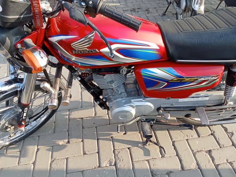 Honda 125 Islamabad register 2022 model smart card own name 4