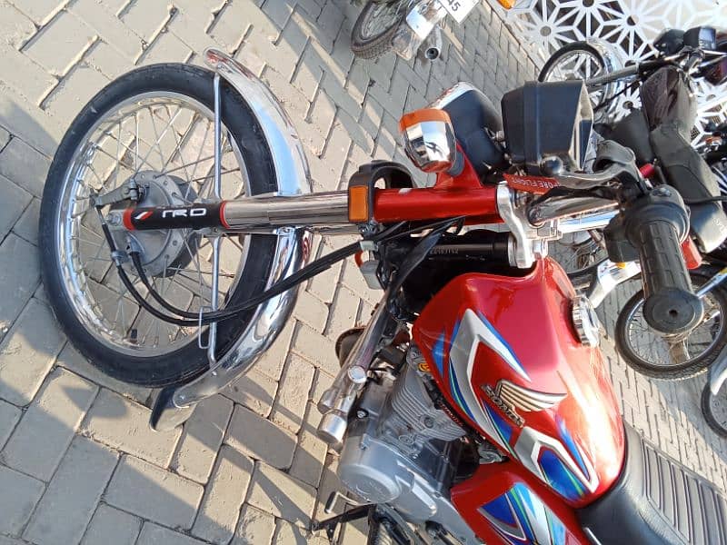 Honda 125 Islamabad register 2022 model smart card own name 10