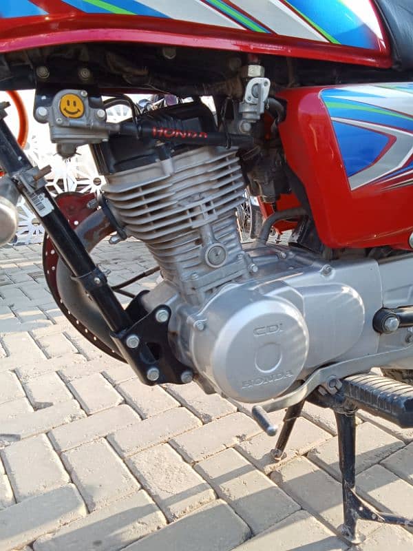 Honda 125 Islamabad register 2022 model smart card own name 11