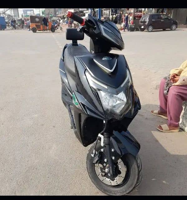 female scooty made by crown bike limited. 0