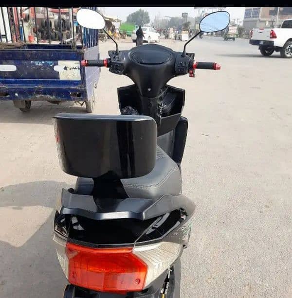 female scooty made by crown bike limited. 1