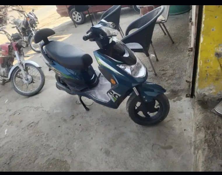 female scooty made by crown bike limited. 3