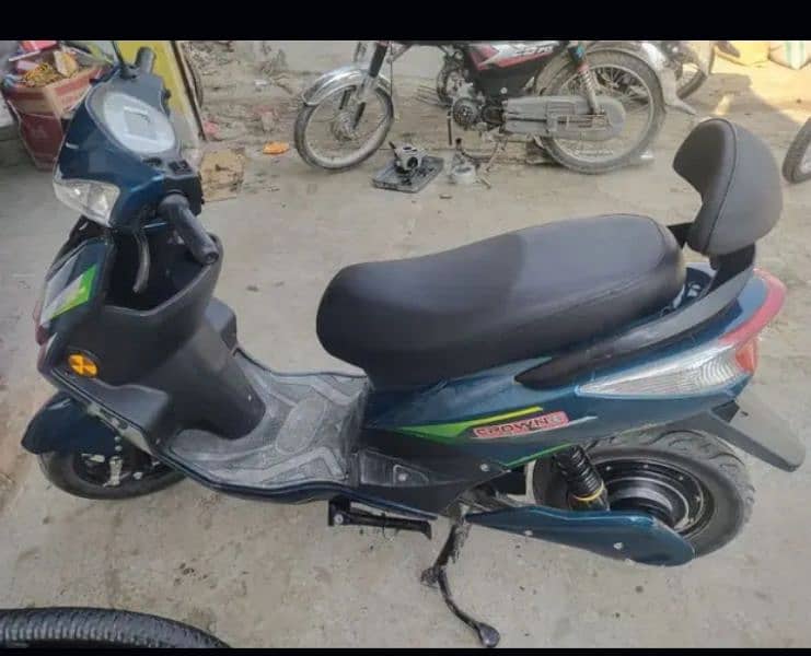 female scooty made by crown bike limited. 4