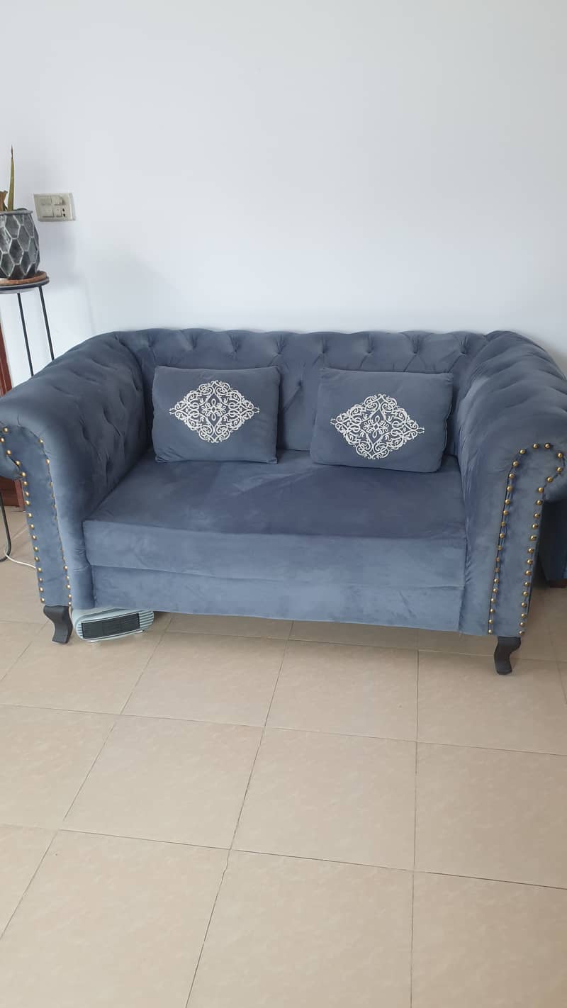 2 seater almost new sofa 2