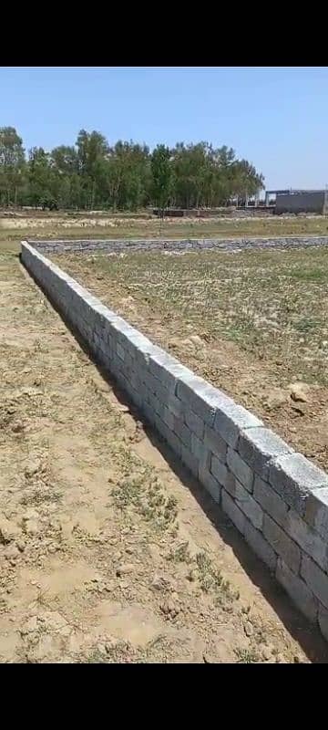 Square Plot Near Canal Road Mardan 0