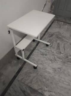 you can use this table as a laptop table or  for eating.