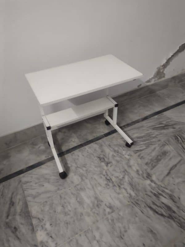 you can use this table as a laptop table or  for eating. 1